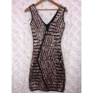 SOLD Women’s sparkly dress with plunging neckline